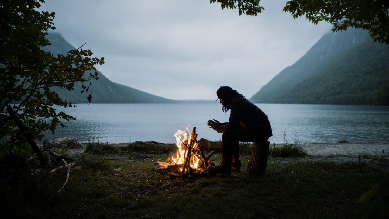 Warming up by the campfire at Lake Willoughby in Westmore, Vermont Warming up by the campfire at Lake Willoughby in Westmore, Vermont