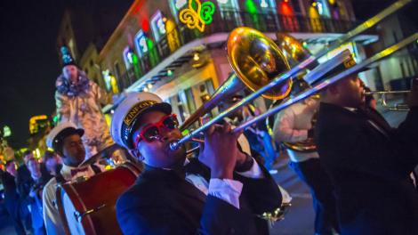 Brass band parading through the French Quarter Brass band parading through the French Quarter