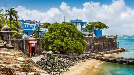 Brightly colored buildings lining San Juan Harbor Brightly colored buildings lining San Juan Harbor