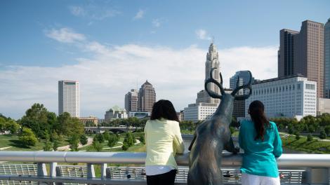 Posing with a sculpture in Bicentennial Park in Columbus, Ohio Posing with a sculpture in Bicentennial Park in Columbus, Ohio