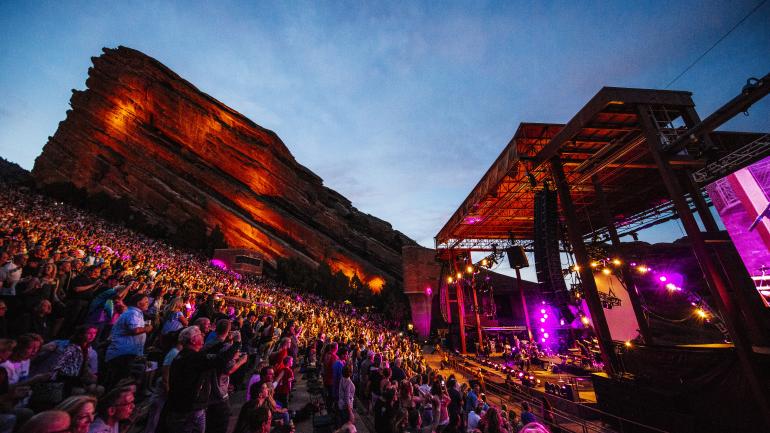 Revelers at a concert at the incredible Red Rocks Park & Amphitheatre Revelers at a concert at the incredible Red Rocks Park & Amphitheatre