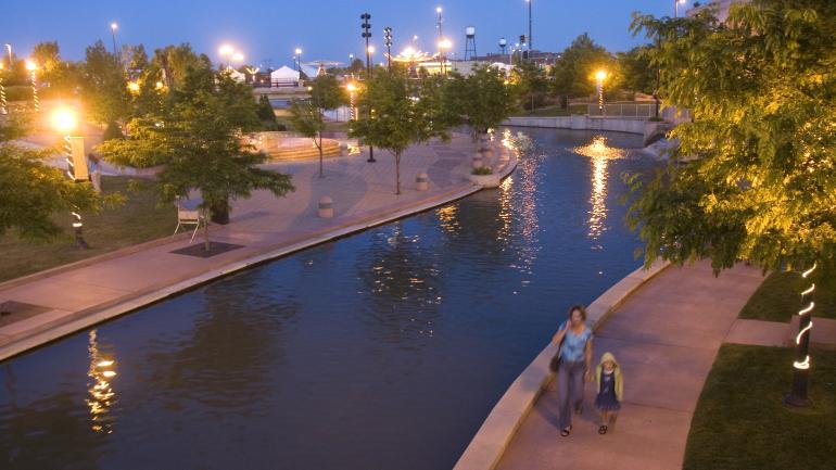 Stoll down the Historic Arkansas Riverwalk of Pueblo, Colorado, for scenic views of the winding Arkansas River. Stoll down the Historic Arkansas Riverwalk of Pueblo, Colorado, for scenic views of the winding Arkansas River.