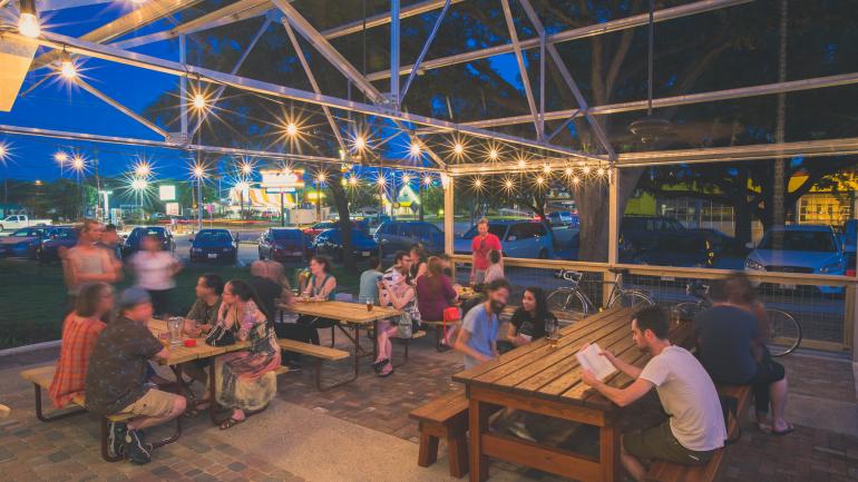 At Austin’s Radio Coffee & Beer, stop in for a drink or hang out for a while at the outdoor seating area. At Austin’s Radio Coffee & Beer, stop in for a drink or hang out for a while at the outdoor seating area.
