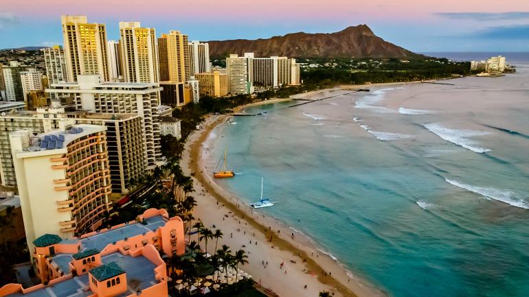 Waikiki Beach surrounded by stylish hotels, restaurant, shops and Diamond Head Waikiki Beach surrounded by stylish hotels, restaurant, shops and Diamond Head