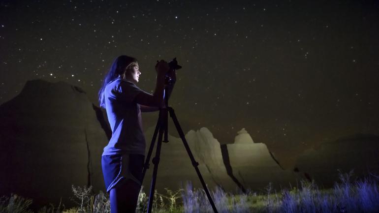 View the galaxy against the backdrop of the otherworldly landscape of Badlands National Park. View the galaxy against the backdrop of the otherworldly landscape of Badlands National Park.