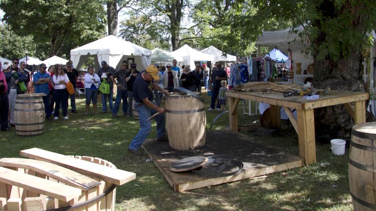 Assembling a barrel at the Bourbon Festival in Bardstown, Kentucky Assembling a barrel at the Bourbon Festival in Bardstown, Kentucky