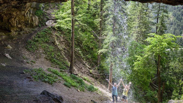 After an invigorating climb to Community Caves in Spearfish Canyon, hikers can cool off in the waterfall. After an invigorating climb to Community Caves in Spearfish Canyon, hikers can cool off in the waterfall.