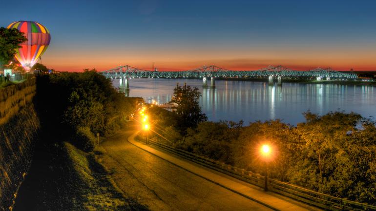 Streetlit roadway by the Mississippi River in Natchez, Mississippi Streetlit roadway by the Mississippi River in Natchez, Mississippi