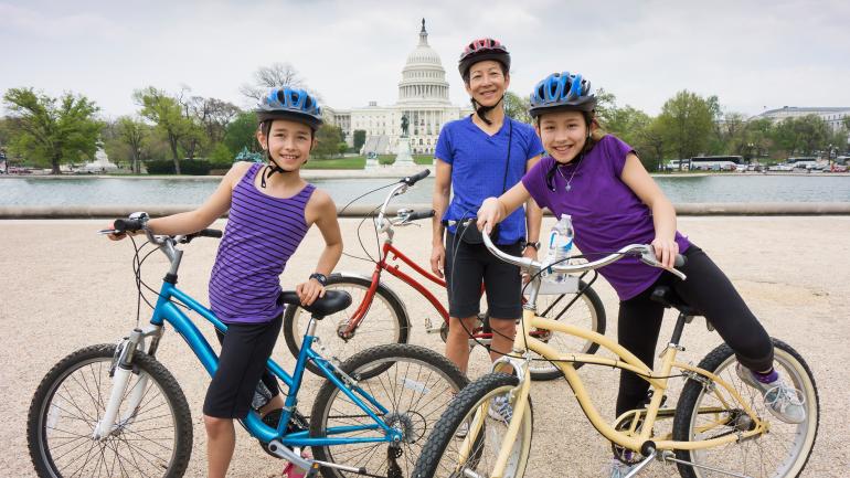 Cycling in front of the Capitol Reflecting Pool in Washington D.C. Cycling in front of the Capitol Reflecting Pool in Washington D.C.