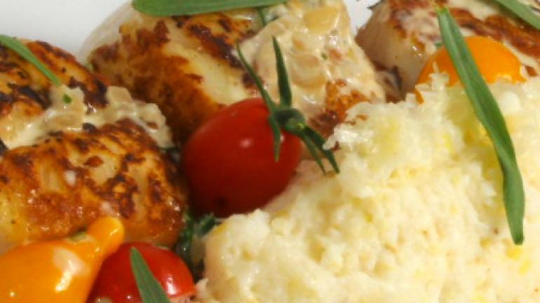 Scallops paired with grits and tomatoes at Holly Hill Inn Scallops paired with grits and tomatoes at Holly Hill Inn