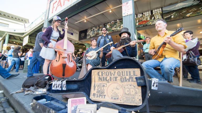Buskers outside Pike Place Market in Seattle, Washington Buskers outside Pike Place Market in Seattle, Washington