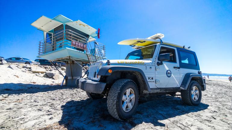 Lifeguard stand and Jeep on the beach in San Diego, California Lifeguard stand and Jeep on the beach in San Diego, California