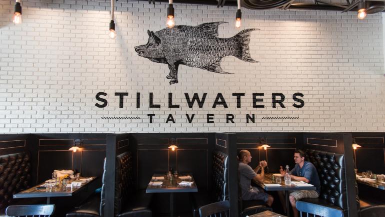 The harvests of local farmers and fishers inform the menu at Stillwaters Tavern. The harvests of local farmers and fishers inform the menu at Stillwaters Tavern.