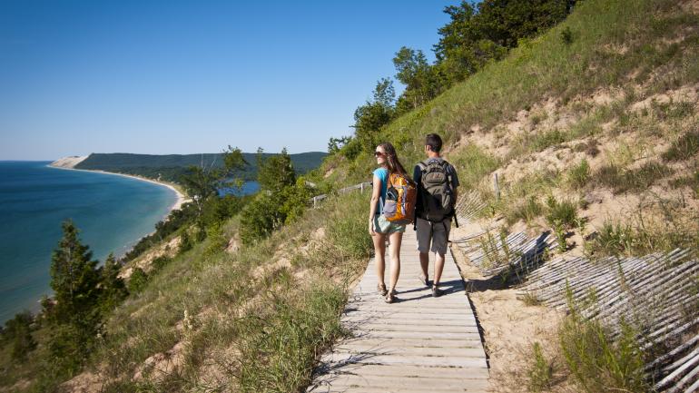 Sleeping Bear Dunes National Lakeshore and the Sleeping Bear Heritage Trail offer stunning Lake Michigan views. Sleeping Bear Dunes National Lakeshore and the Sleeping Bear Heritage Trail offer stunning Lake Michigan views.