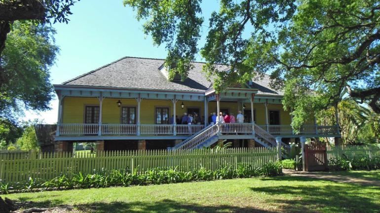 The bright-yellow Laura Plantation house was built in a Creole style and shelters plenty of fascinating Southern history. The bright-yellow Laura Plantation house was built in a Creole style and shelters plenty of fascinating Southern history.