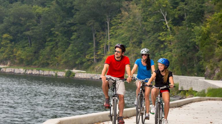 Biking the C&O Canal Towpath offers forest and river views through the Potomac River valley. Biking the C&O Canal Towpath offers forest and river views through the Potomac River valley.