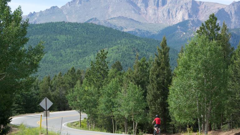 The Pikes Peak Highway allows visitors to reach the fabled peak by car or bicycle. The Pikes Peak Highway allows visitors to reach the fabled peak by car or bicycle.