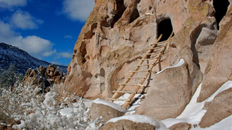 Rooms carved into cliffs at Bandelier National Monument Rooms carved into cliffs at Bandelier National Monument