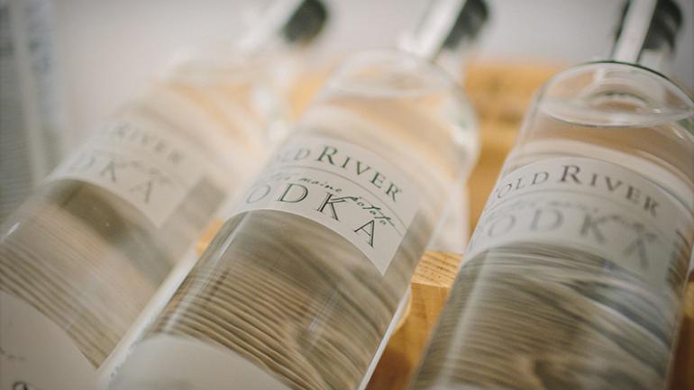 Cold River makes their vodkas with locally grown potatoes and adds botanical flavors for a unique taste. Cold River makes their vodkas with locally grown potatoes and adds botanical flavors for a unique taste.