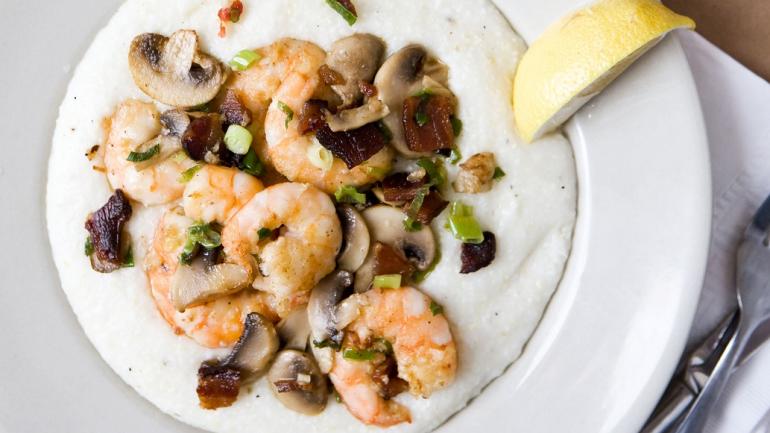 Hominy Grill presents Southern classics with a Charleston flourish, such as Shrimp and Grits, with a side of peanuts and sweet tea. Hominy Grill presents Southern classics with a Charleston flourish, such as Shrimp and Grits, with a side of peanuts and sweet tea.