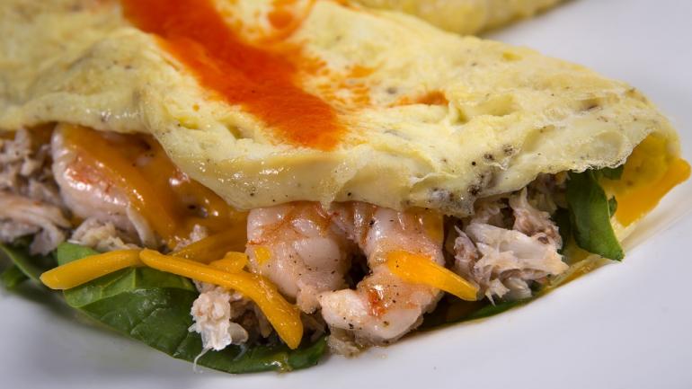 South Carolina born and raised, Chef Forrest Parker of the Old Village Post House in Mount Pleasant uses fresh, local ingredients in his creations, such as a shrimp-and-crab omelet. South Carolina born and raised, Chef Forrest Parker of the Old Village Post House in Mount Pleasant uses fresh, local ingredients in his creations, such as a shrimp-and-crab omelet.