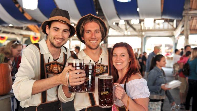 Raise your stein of beer at a traditional German Oktoberfest celebration in Columbus, Ohio. Raise your stein of beer at a traditional German Oktoberfest celebration in Columbus, Ohio.