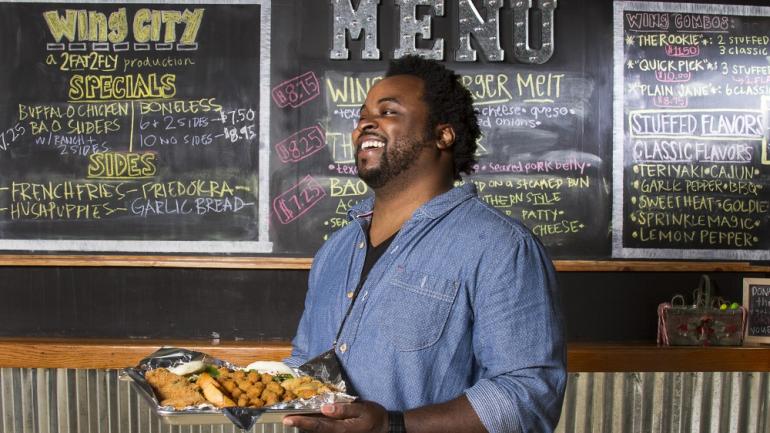 The wings fly out of Chef Ramon Dickerson’s 2 Fat 2 Fly Wing City in Columbia, featuring multiple varieties and mouth-watering sides. The wings fly out of Chef Ramon Dickerson’s 2 Fat 2 Fly Wing City in Columbia, featuring multiple varieties and mouth-watering sides.