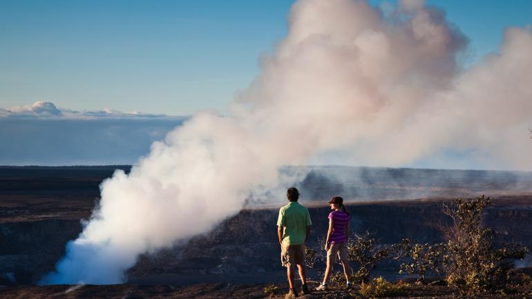 Smoke rises from a volcanic crater at Hawaiʻi Volcanoes National Park Smoke rises from a volcanic crater at Hawaiʻi Volcanoes National Park