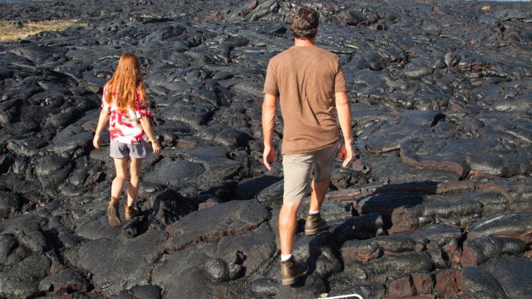 Hiking across lava fields at Hawaiʻi Volcanoes National Park Hiking across lava fields at Hawaiʻi Volcanoes National Park