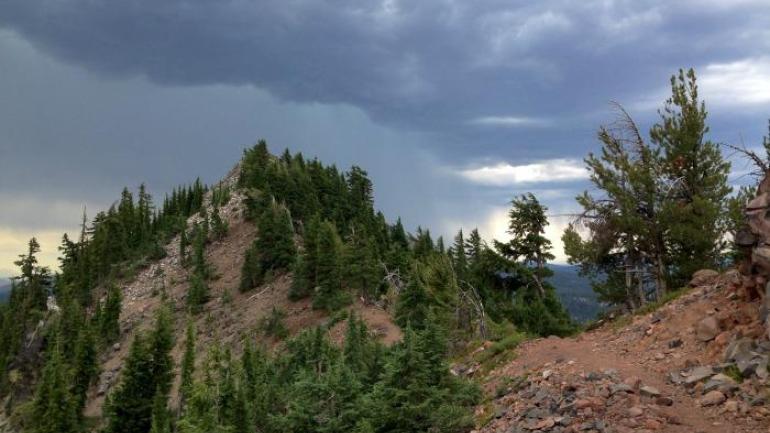 I hustled up the trail, pausing to take photos of the mounting storm because it was so beautiful as it chased me along the ridge. I hustled up the trail, pausing to take photos of the mounting storm because it was so beautiful as it chased me along the ridge.