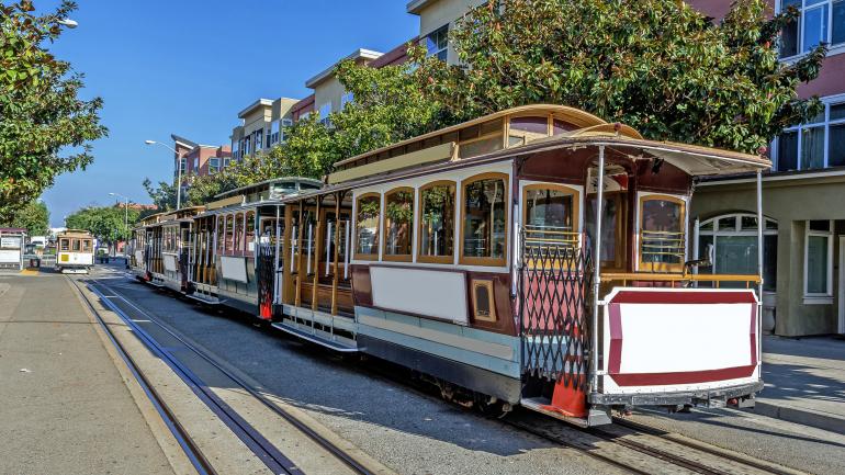 San Francisco's cable cars are a popular tourist attraction. San Francisco's cable cars are a popular tourist attraction.