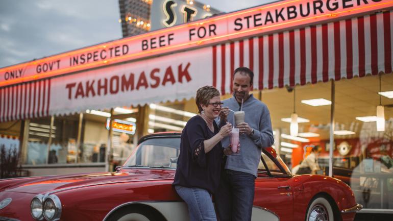 A couple enjoying classic milkshakes on Springfield's strech of Route 66 A couple enjoying classic milkshakes on Springfield's strech of Route 66