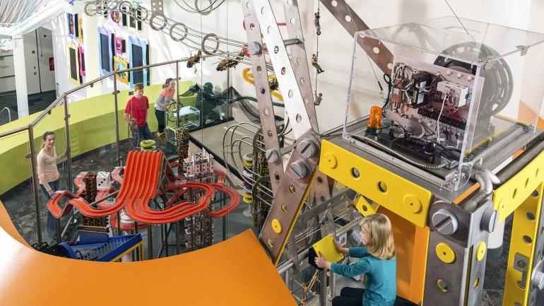 Cranks, pulleys and cords let you interact with a giant toy sculpture Cranks, pulleys and cords let you interact with a giant toy sculpture