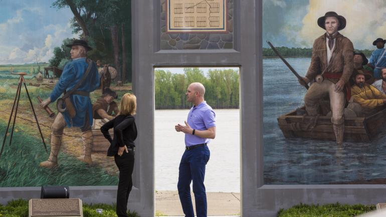 Learning about the murals on the floodwall in Paducah, Kentucky, overlooking the Ohio River Learning about the murals on the floodwall in Paducah, Kentucky, overlooking the Ohio River
