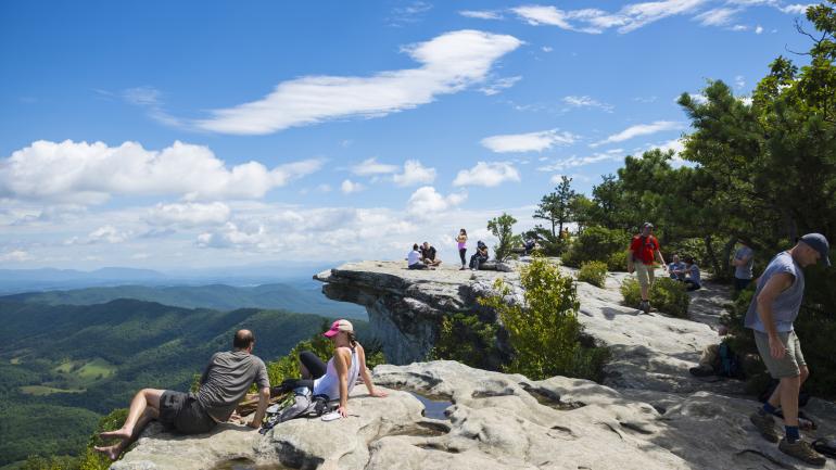 Taking in the views from McAfee Knob outside Roanoke, Virginia Taking in the views from McAfee Knob outside Roanoke, Virginia