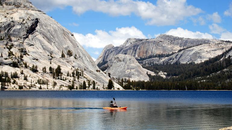 Paddling around in a kayak on Tenaya Lake Paddling around in a kayak on Tenaya Lake