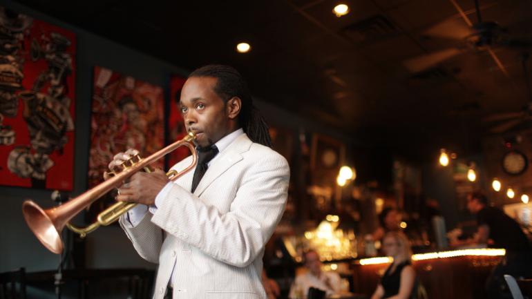 Playing on Frenchmen Street in New Orleans, Louisiana Playing on Frenchmen Street in New Orleans, Louisiana