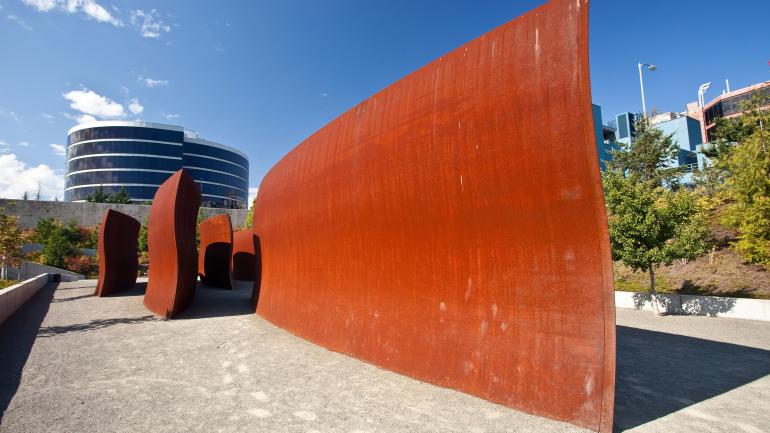 Admiring outdoor artwork in Olympic Sculpture Park Admiring outdoor artwork in Olympic Sculpture Park