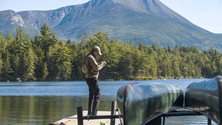 Fishing at the Kidney Pond dock in Baxter State Park Fishing at the Kidney Pond dock in Baxter State Park