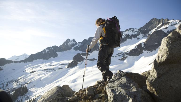 Backpacking along the snowy peaks of the Cascade Range Backpacking along the snowy peaks of the Cascade Range
