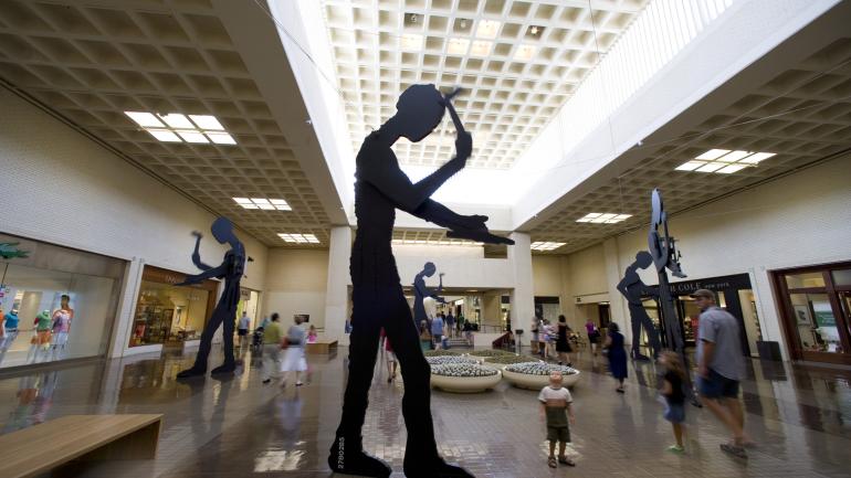 Five Hammering Men sculptures in NorthPark Center in Dallas Five Hammering Men sculptures in NorthPark Center in Dallas