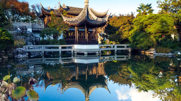 Serene reflections in a pond at the Lan Su Chinese Garden Serene reflections in a pond at the Lan Su Chinese Garden