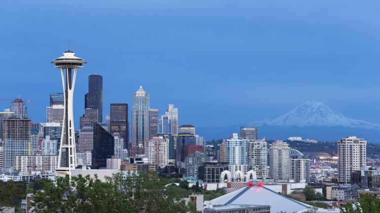 A stunning evening view of the Space Needle and the Seattle skyline A stunning evening view of the Space Needle and the Seattle skyline