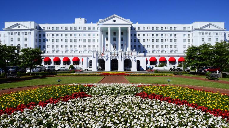 The stunning façade and exterior landscape of The Greenbrier resort in White Sulphur Springs, West Virginia The stunning façade and exterior landscape of The Greenbrier resort in White Sulphur Springs, West Virginia