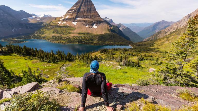 Taking in the views during a hike at Glacier National Park. Taking in the views during a hike at Glacier National Park.