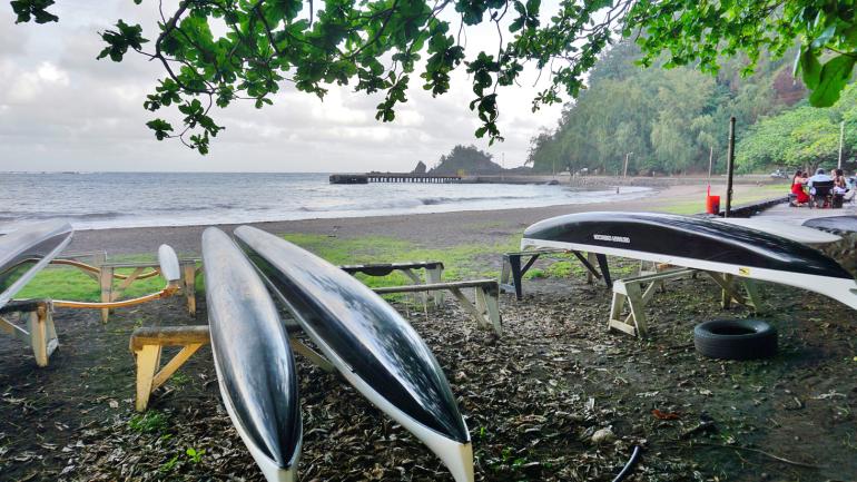 Kayaks resting at a coastal stop on the Hana Highway Kayaks resting at a coastal stop on the Hana Highway