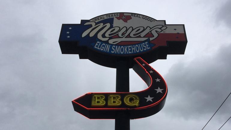 Sign for barbecue restaurant in Elgin, Texas Sign for barbecue restaurant in Elgin, Texas