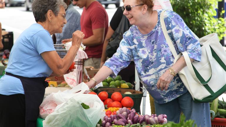 Stocking up on produce at the Atlantic City Farmers Market in New Jersey Stocking up on produce at the Atlantic City Farmers Market in New Jersey