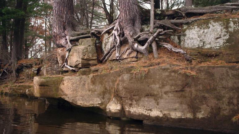 The rocky shoreline of the St. Croix River The rocky shoreline of the St. Croix River