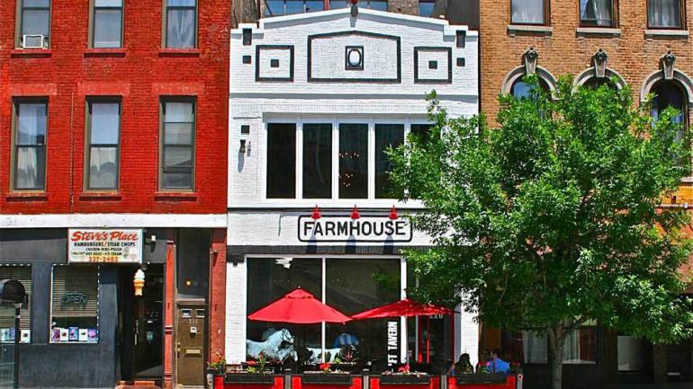 The welcoming exterior and sidewalk seating of Farmhouse Chicago The welcoming exterior and sidewalk seating of Farmhouse Chicago